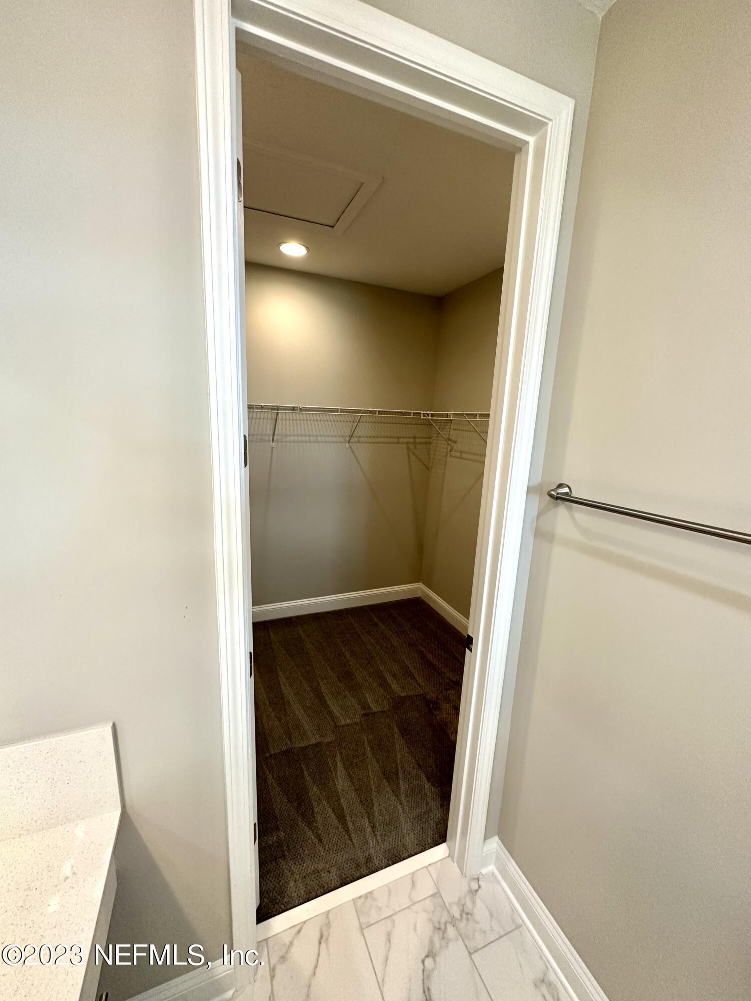 481 Marquesa Circle St. Johns, FL 32259 - Photo 45 of 53 a bathroom with a tub and shower