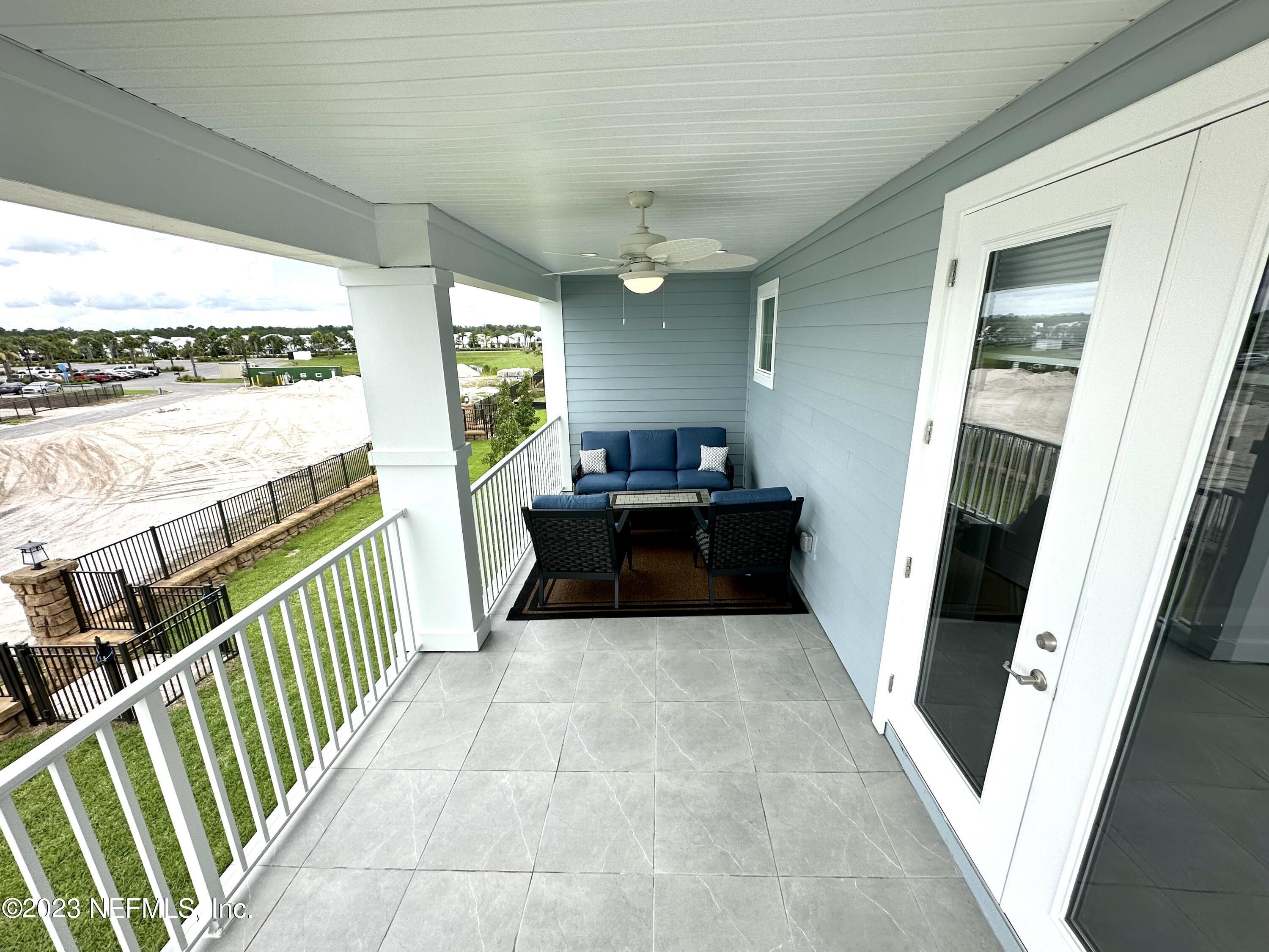 481 Marquesa Circle St. Johns, FL 32259 - Photo 50 of 53 a view of a kitchen with furniture and staircase