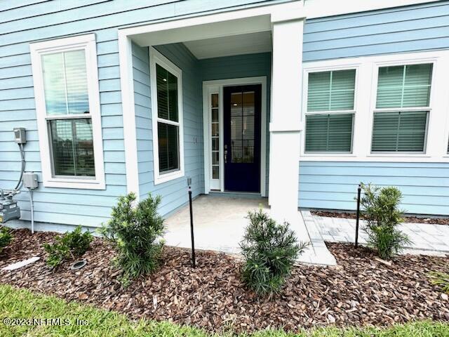 481 Marquesa Circle St. Johns, FL 32259 - Photo 5 of 53 a front view of a house with a yard