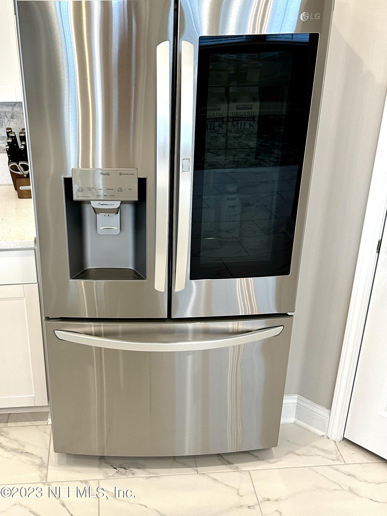 481 Marquesa Circle St. Johns, FL 32259 - Photo 9 of 53 a view of a refrigerator in a kitchen