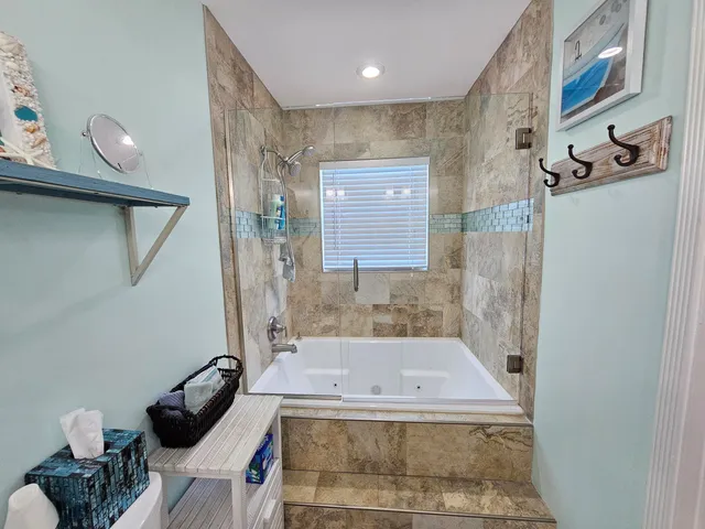 a bathroom with a sink and a shower