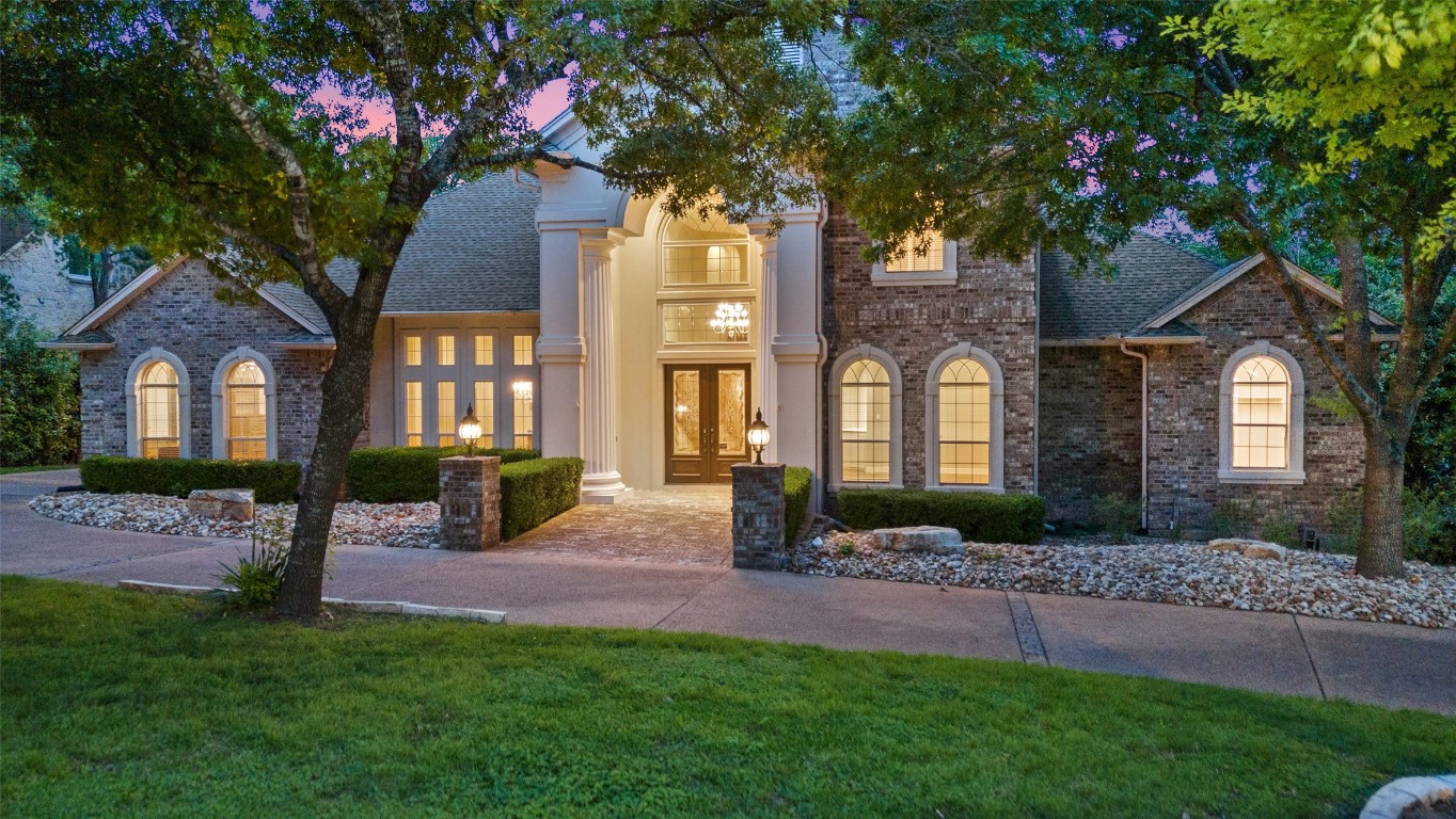 Timeless luxury home on over a half-acre in the prestigious Reserve at Oak Bluff Estates.