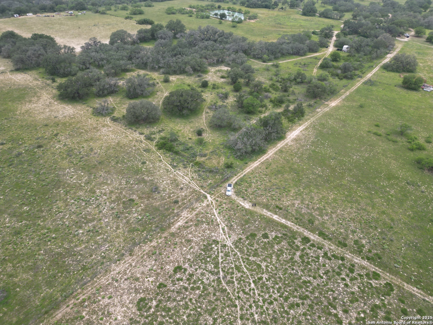 970 Newman Road Poteet, TX 78065 - Photo 23 of 30 a view of a yard