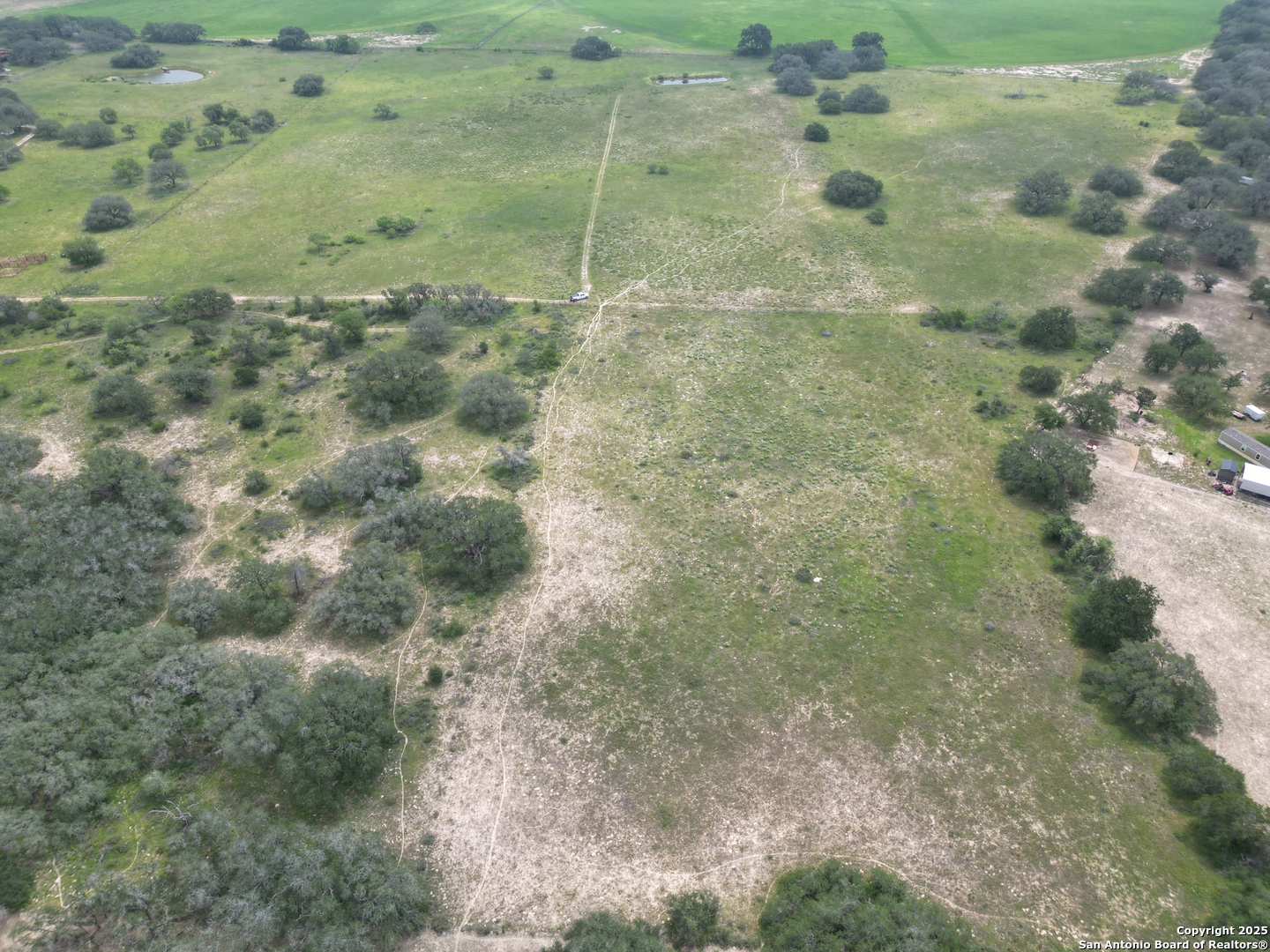 970 Newman Road Poteet, TX 78065 - Photo 24 of 30 a view of a dry yard