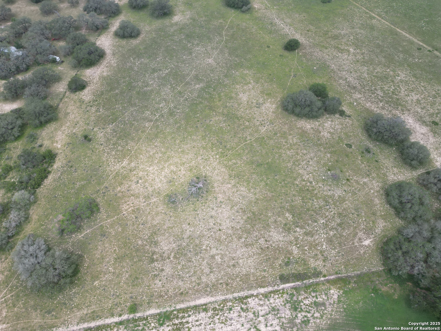 970 Newman Road Poteet, TX 78065 - Photo 27 of 30 a bathroom with a shower
