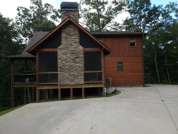 a front view of a house with garage