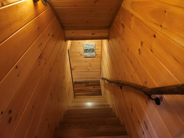 a bathroom with a shower and a mirror