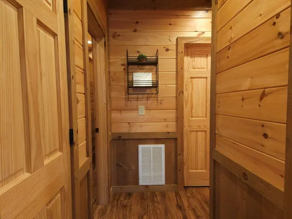 a view of backyard with wooden fence and a slide