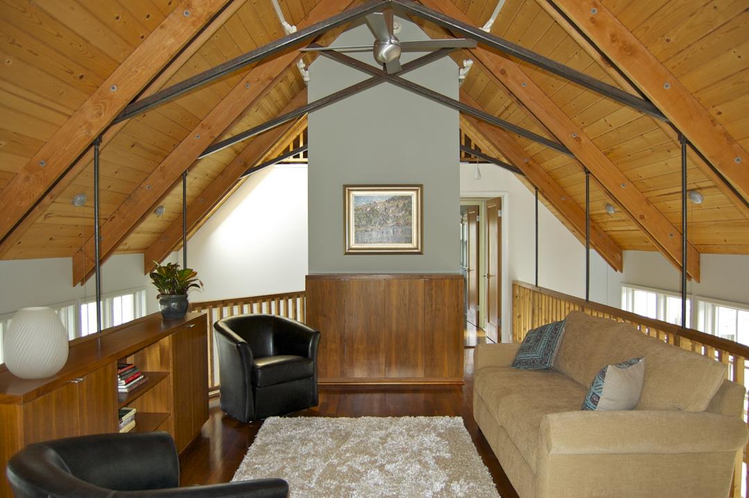 228 Kelly Avenue Half Moon Bay, CA 94019 - Photo 12 of 29 a living room with a couch