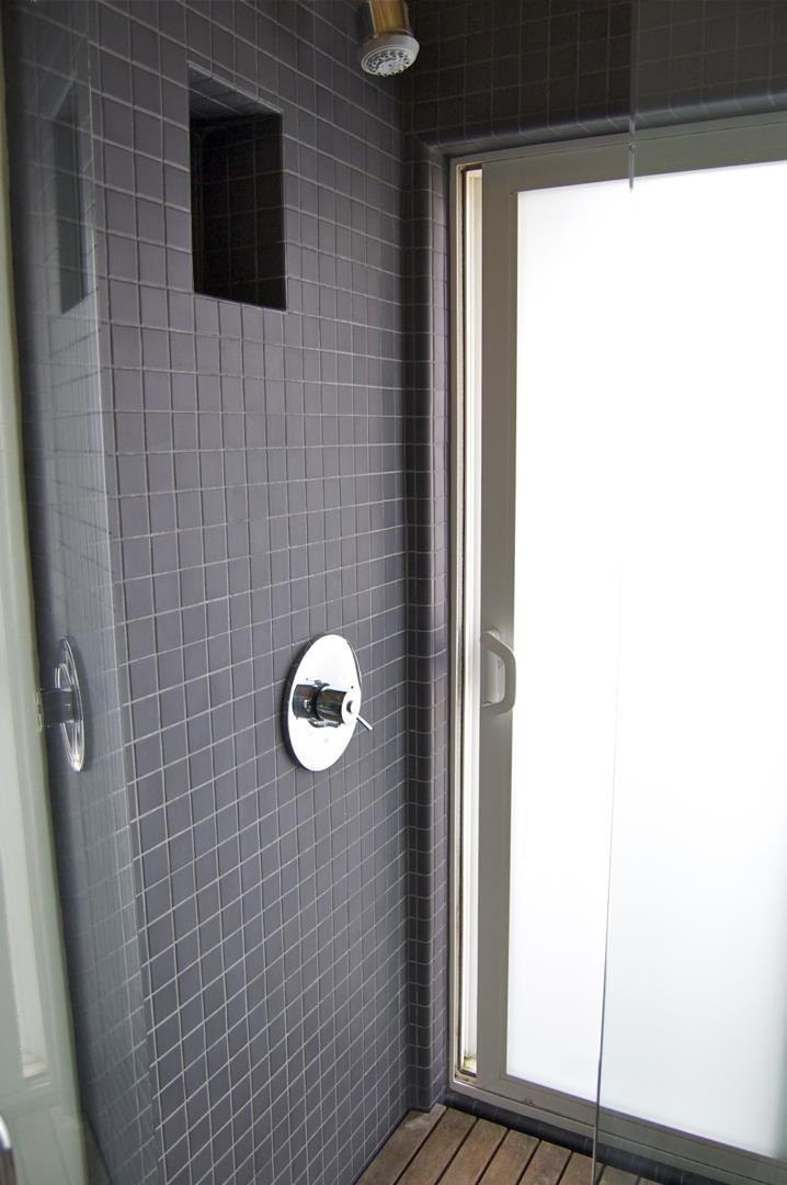 228 Kelly Avenue Half Moon Bay, CA 94019 - Photo 14 of 29 a bathroom with a shower