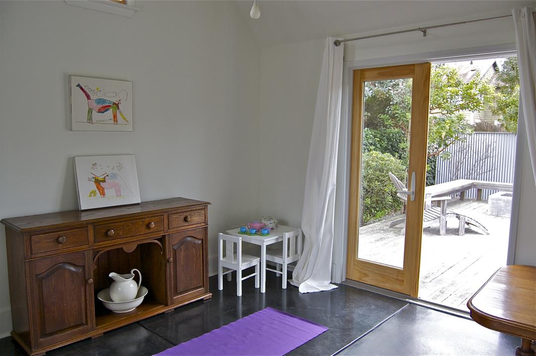 228 Kelly Avenue Half Moon Bay, CA 94019 - Photo 17 of 29 a bed room with a bed and a window