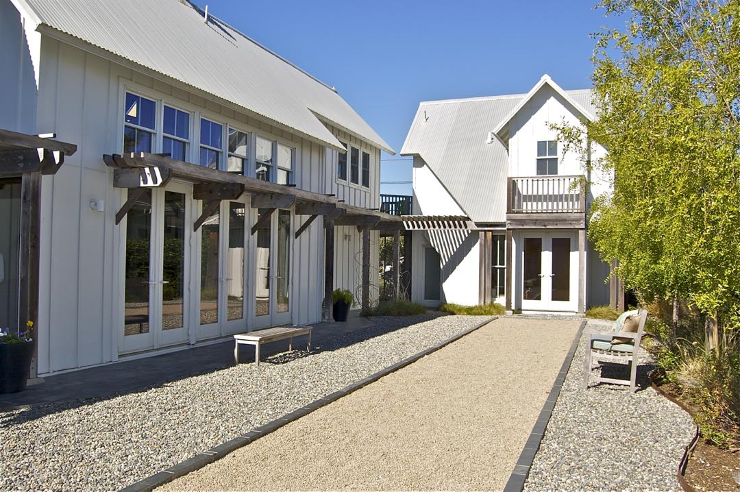 228 Kelly Avenue Half Moon Bay, CA 94019 - Photo 25 of 29 a front view of a house with a yard
