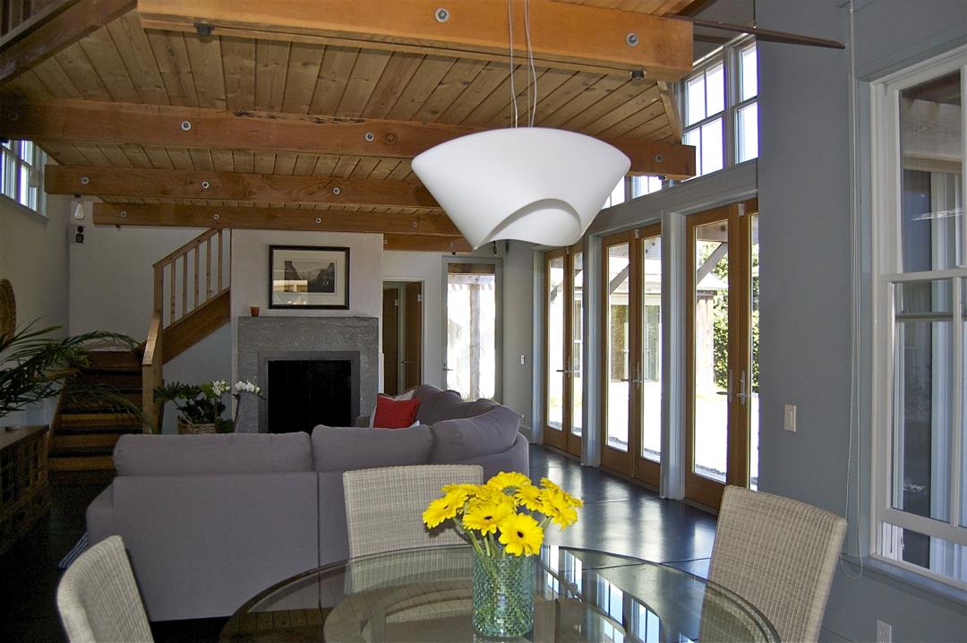228 Kelly Avenue Half Moon Bay, CA 94019 - Photo 3 of 29 a living room with furniture fireplace and a window