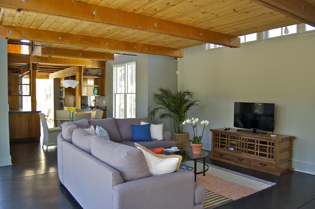 228 Kelly Avenue Half Moon Bay, CA 94019 - Photo 5 of 29 a living room with furniture and a flat screen tv