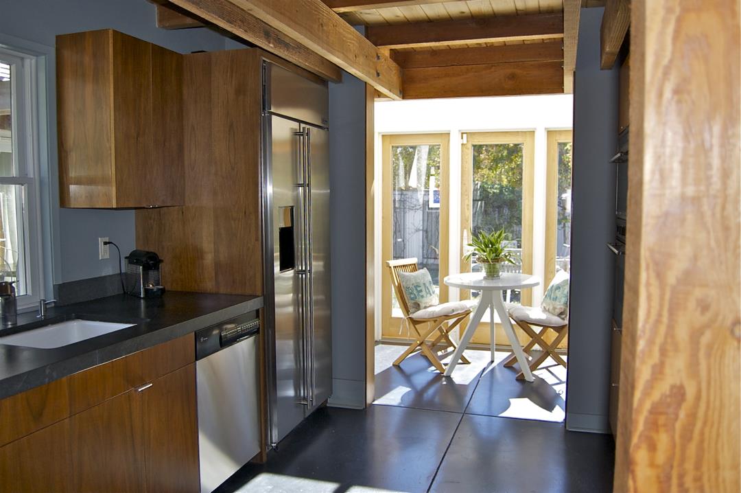 228 Kelly Avenue Half Moon Bay, CA 94019 - Photo 7 of 29 a kitchen with sink refrigerator and large window