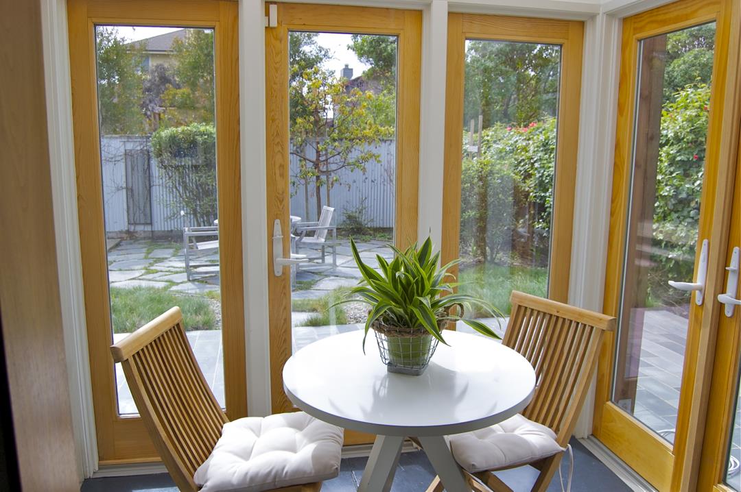 228 Kelly Avenue Half Moon Bay, CA 94019 - Photo 8 of 29 a dining room with furniture wooden floor and a potted plant
