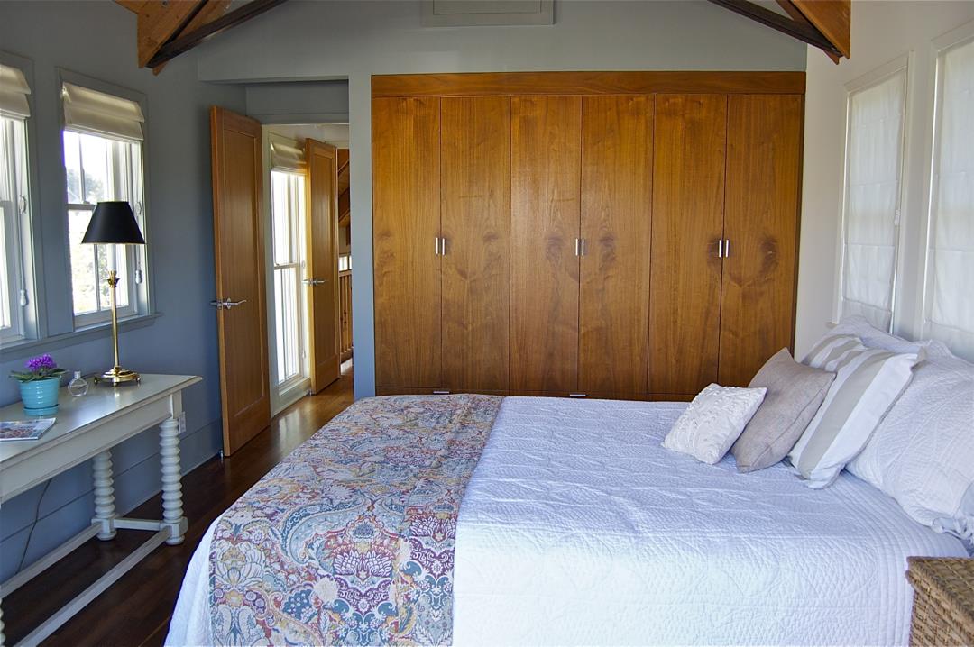 228 Kelly Avenue Half Moon Bay, CA 94019 - Photo 10 of 29 a bedroom with a bed and a dresser