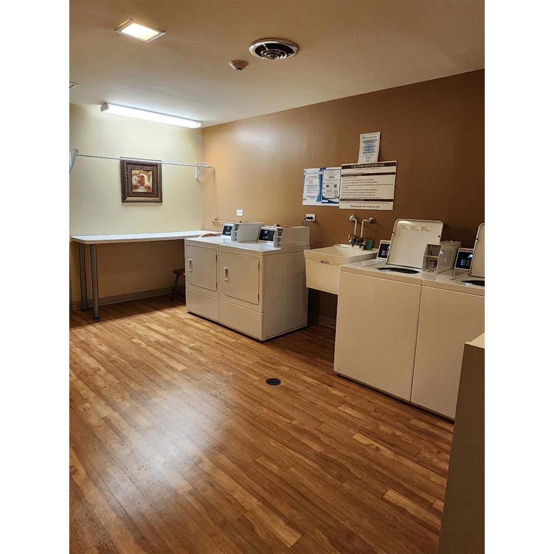1133 South Finley Road, Unit 404 Lombard, IL 60148 - Photo 16 of 18 a room with storage and utility