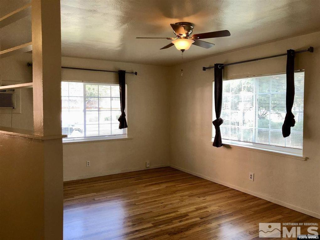 1101 North Sierra Street Reno, NV 89503 - Photo 8 of 10 a view of an empty room with a window and wooden floor