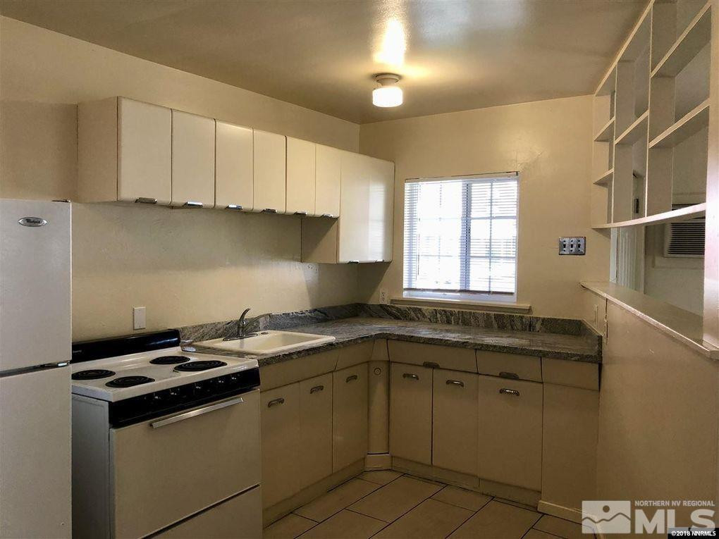 1101 North Sierra Street Reno, NV 89503 - Photo 9 of 10 a kitchen with a sink stove and cabinets