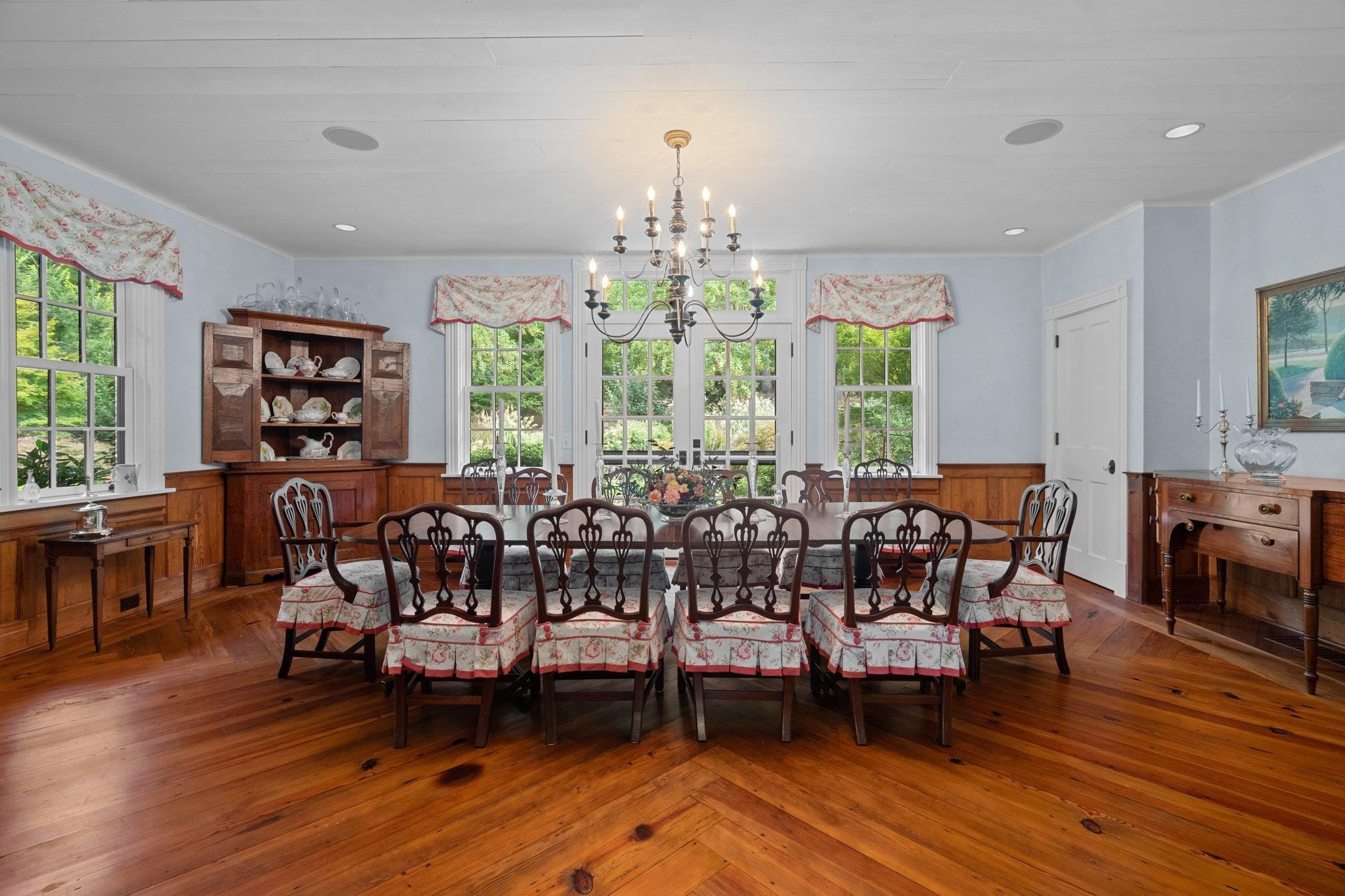 4900 West Cornwallis Road Durham, NC 27705 - Photo 22 of 100 a living room with furniture and a wooden floor