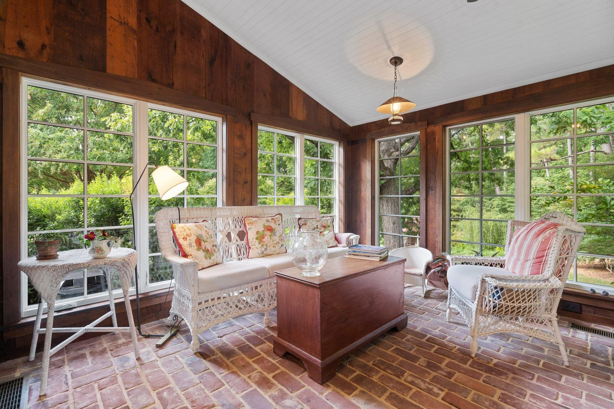 4900 West Cornwallis Road Durham, NC 27705 - Photo 33 of 100 a living room with furniture and large windows