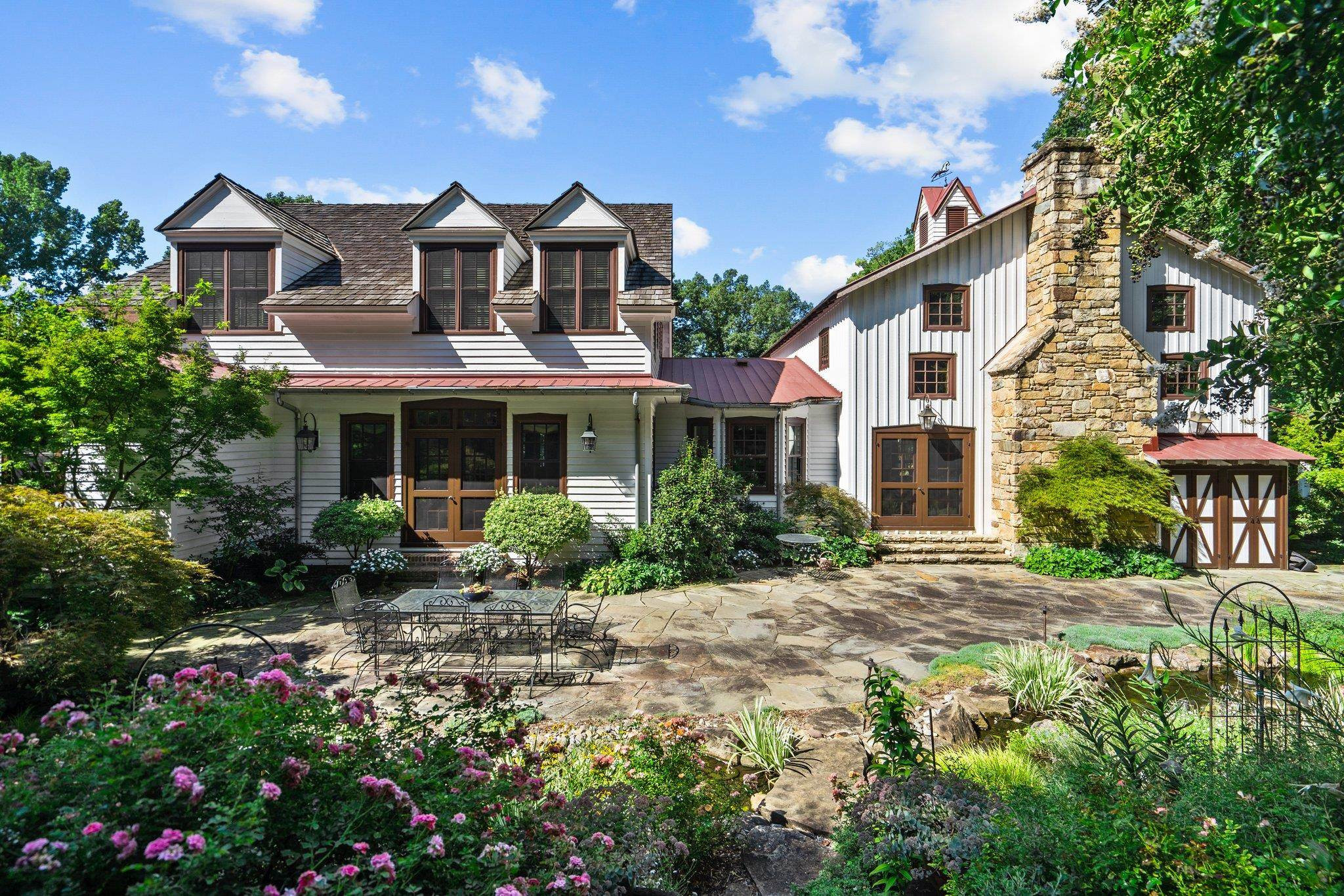 4900 West Cornwallis Road Durham, NC 27705 - Photo 47 of 100 a front view of a residential houses with yard and green space