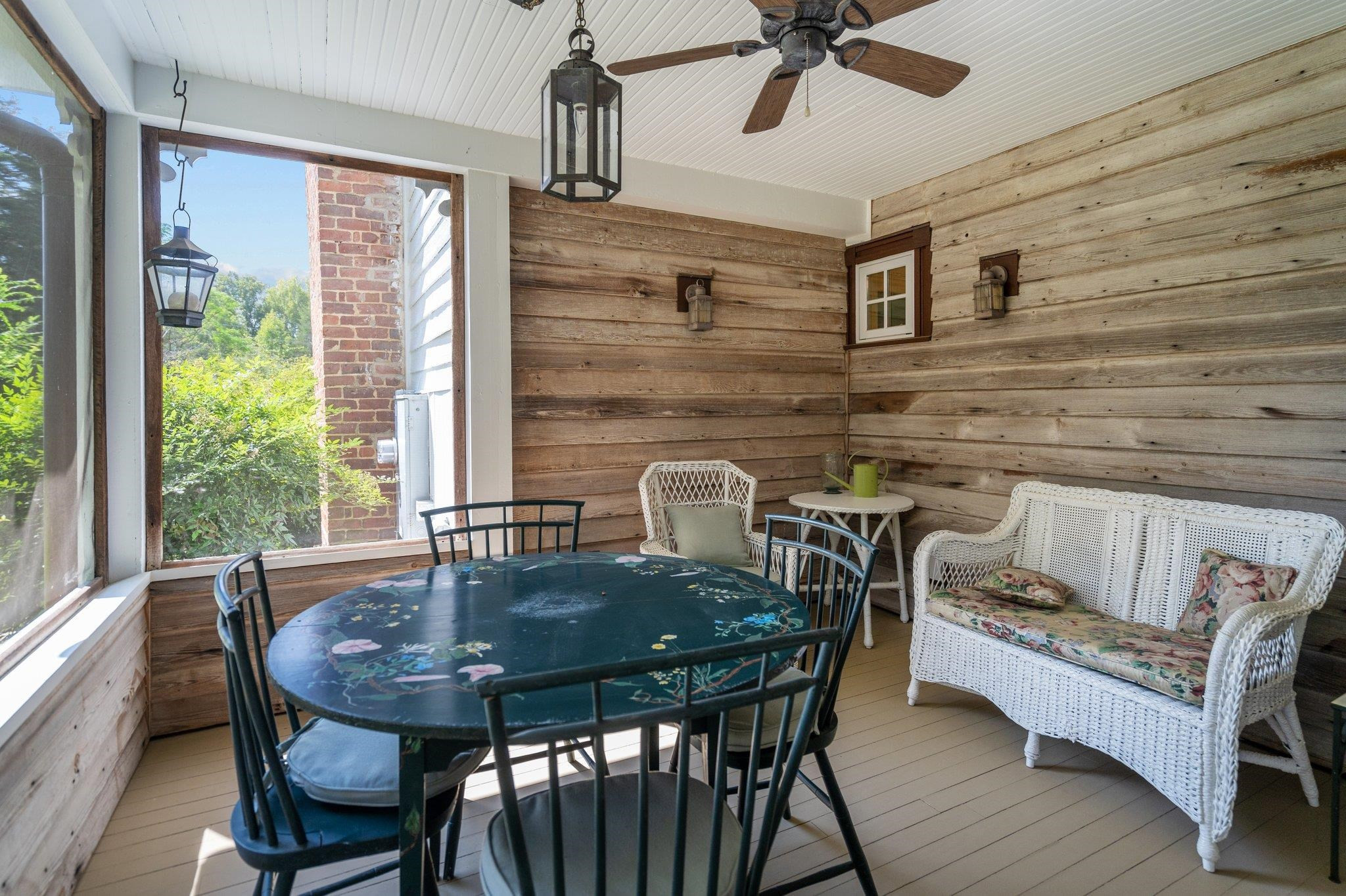 4900 West Cornwallis Road Durham, NC 27705 - Photo 83 of 100 a view of a dining room with furniture and window