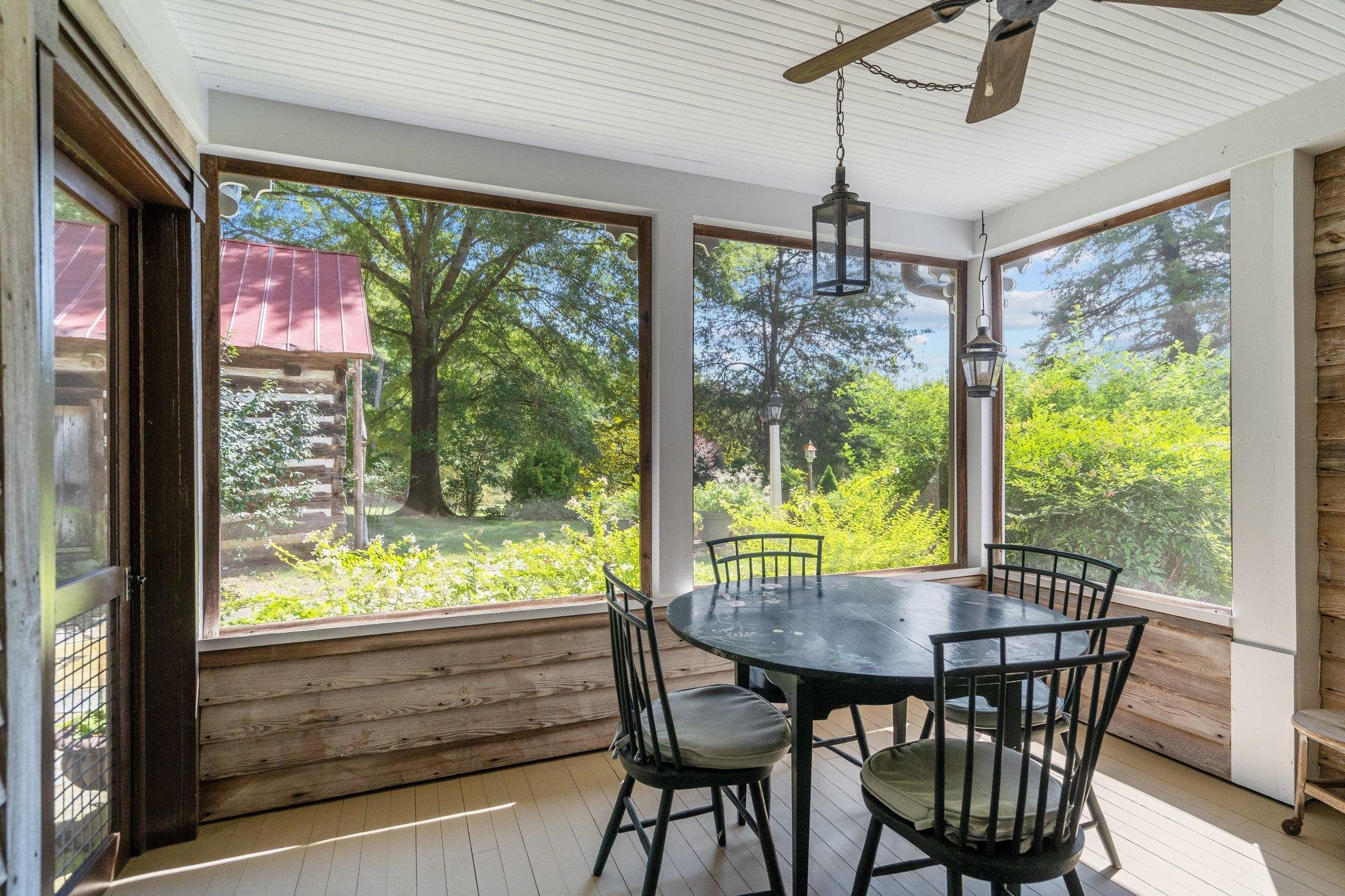 4900 West Cornwallis Road Durham, NC 27705 - Photo 84 of 100 a view of a dining room with furniture window and outside view