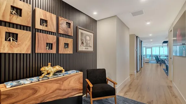 a bedroom with furniture and a book shelf