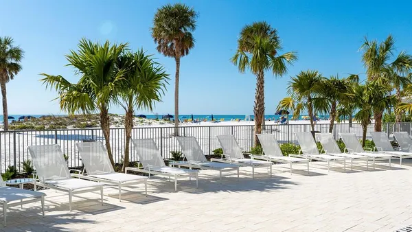 a view of a lounge chair on a beach