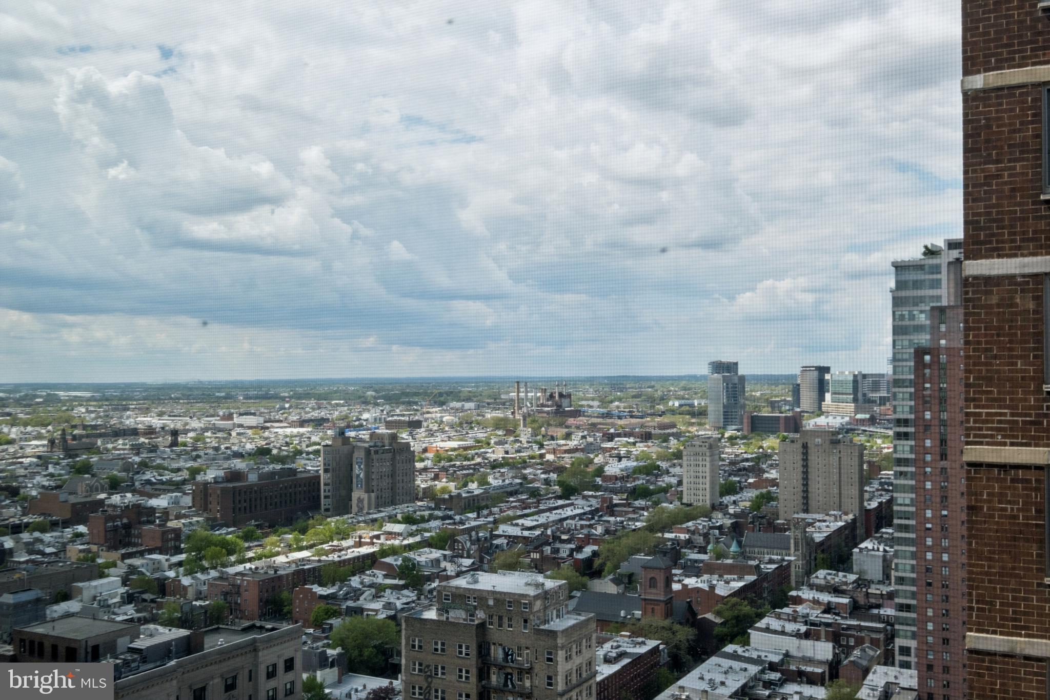 1420 Locust Street, Unit 31H Philadelphia, PA 19102 - Photo 7 of 15 a view of a city with lots of buildings