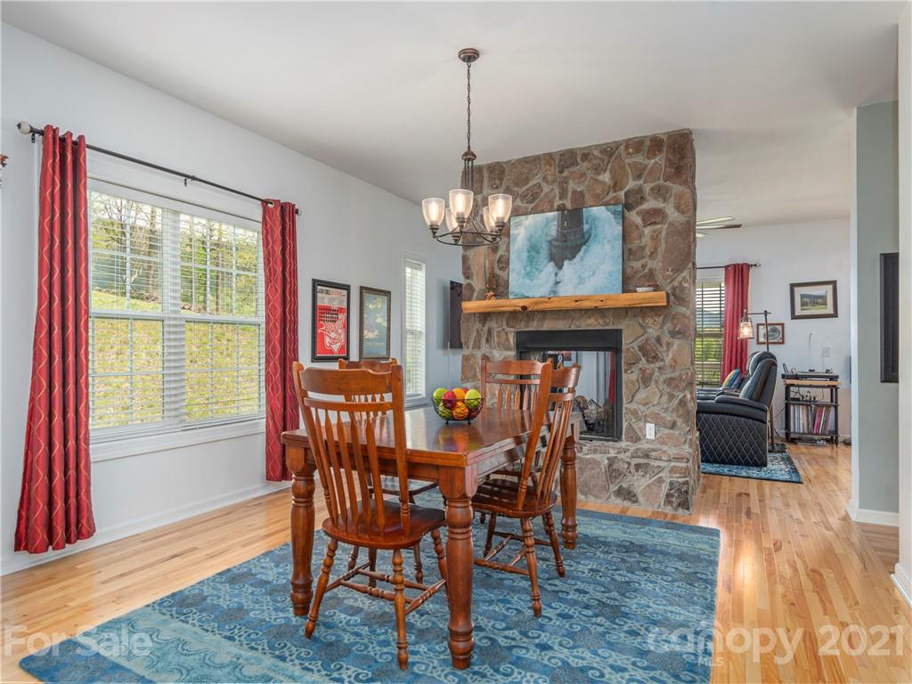 56 Porters Ridge Canton, NC 28716 - Photo 11 of 32 a view of a dining room with furniture window and wooden floor