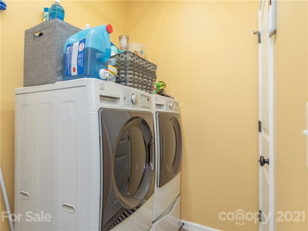 56 Porters Ridge Canton, NC 28716 - Photo 17 of 32 a utility room with dryer and washer