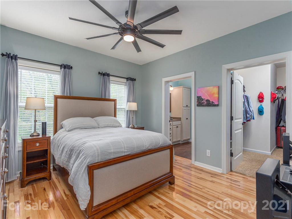 56 Porters Ridge Canton, NC 28716 - Photo 19 of 32 a bedroom with a bed dresser and a window