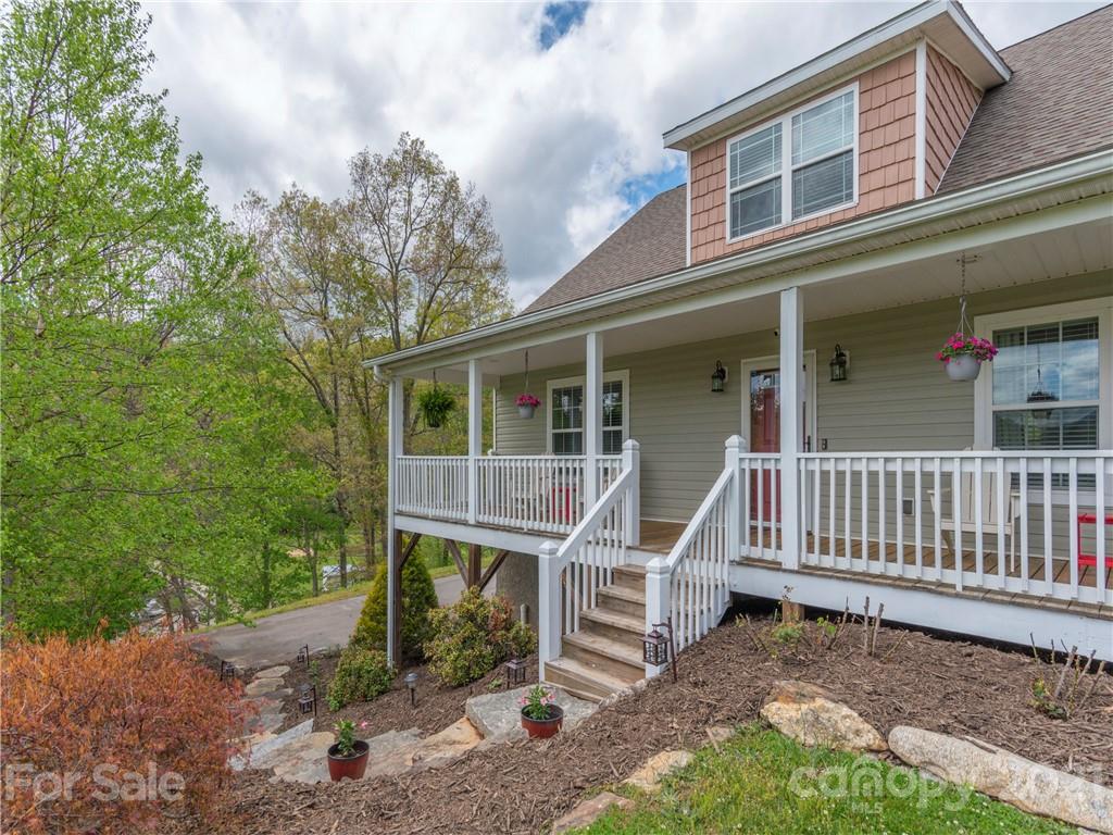 56 Porters Ridge Canton, NC 28716 - Photo 3 of 32 a view of a house with a yard