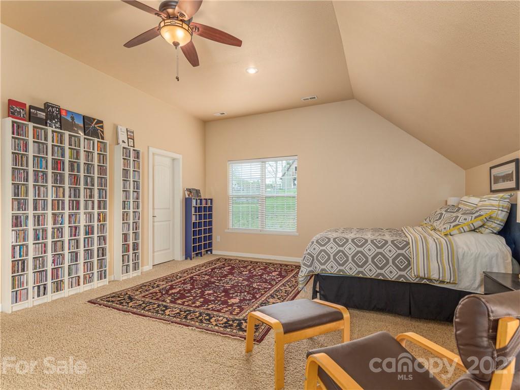56 Porters Ridge Canton, NC 28716 - Photo 23 of 32 a bedroom with furniture and a window