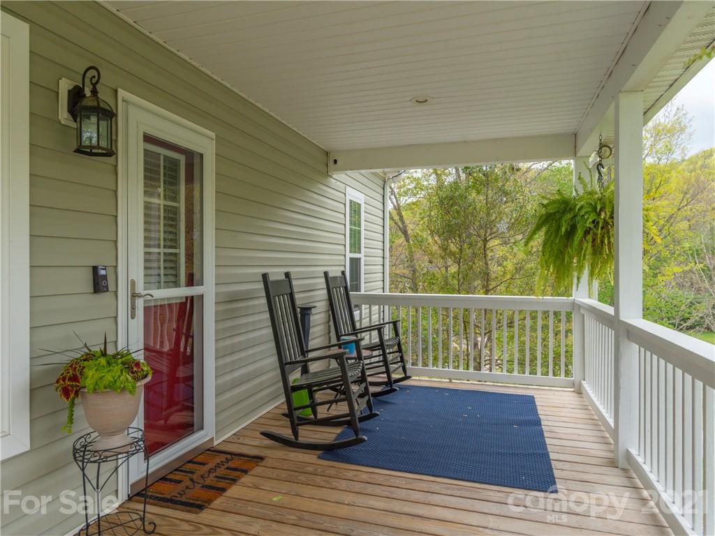 56 Porters Ridge Canton, NC 28716 - Photo 6 of 32 a view of a two chairs in the balcony