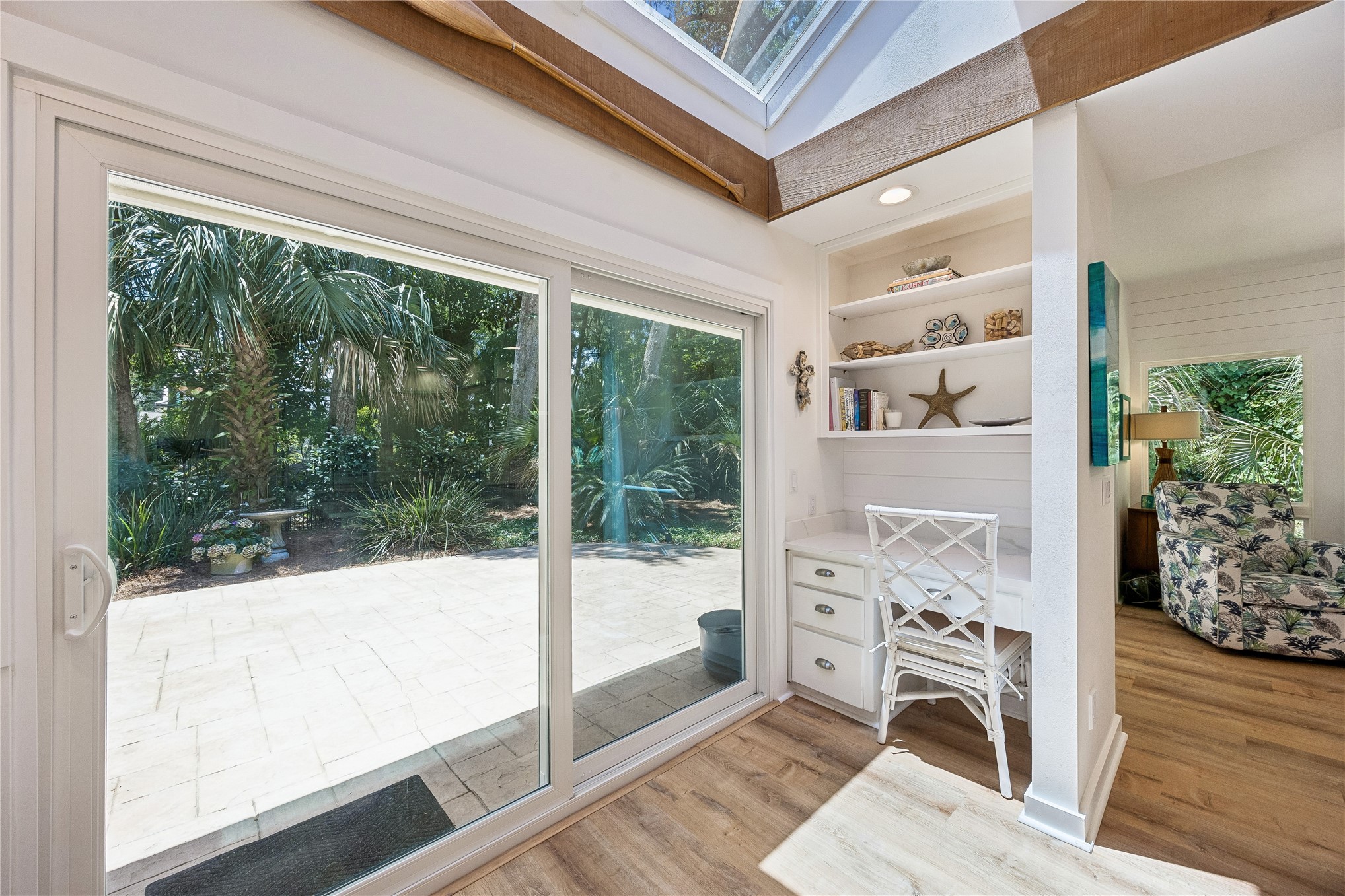 123 Bitternut Road Fernandina Beach, FL 32034 - Photo 24 of 87 Slider off the kitchen onto the open patio with small menu planning station and Keeping Room off to the right.