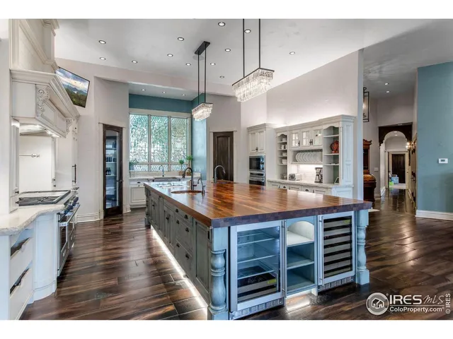 a kitchen with a stove and a sink