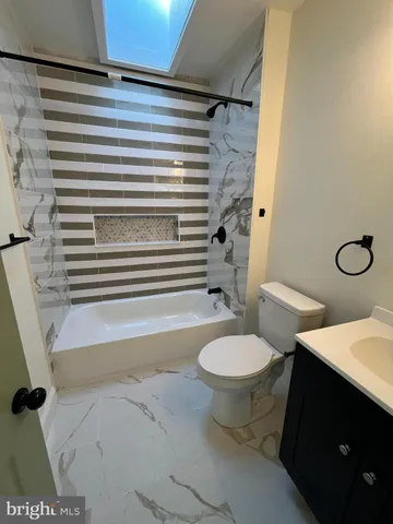 a bathroom with a sink and a toilet