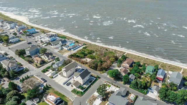an aerial view of residential house with outdoor space