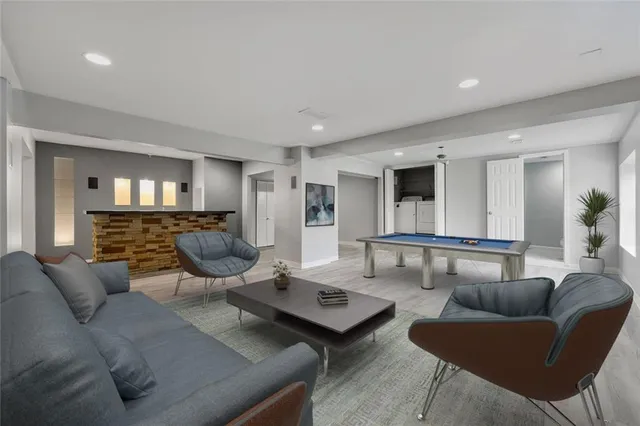 a living room with furniture and a table