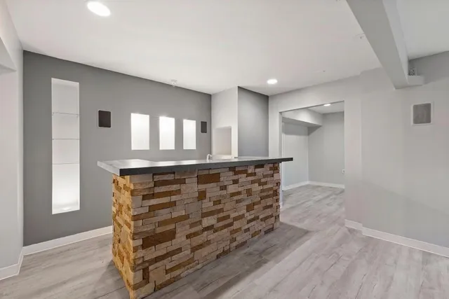 a view of room with wooden floor and window