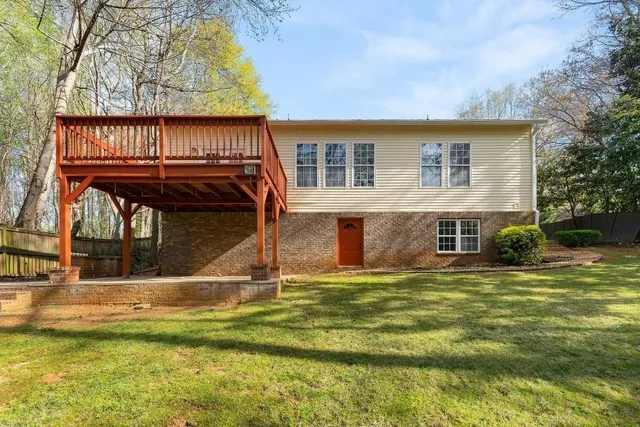 a view of swimming pool with outdoor seating