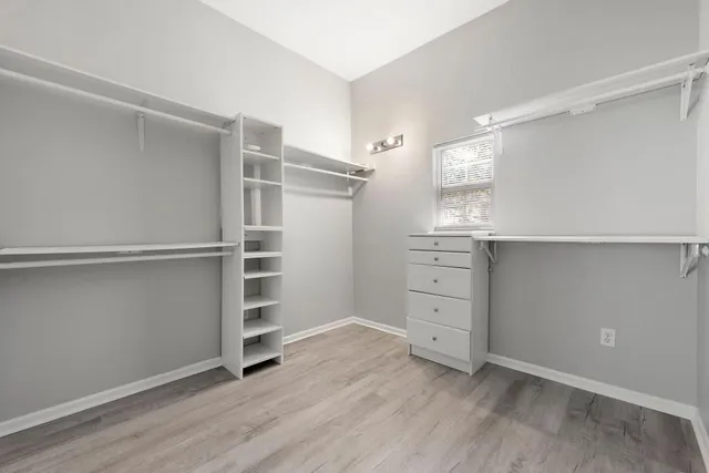 a view of an empty walk in closet