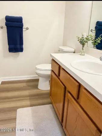a bathroom with a sink and a toilet