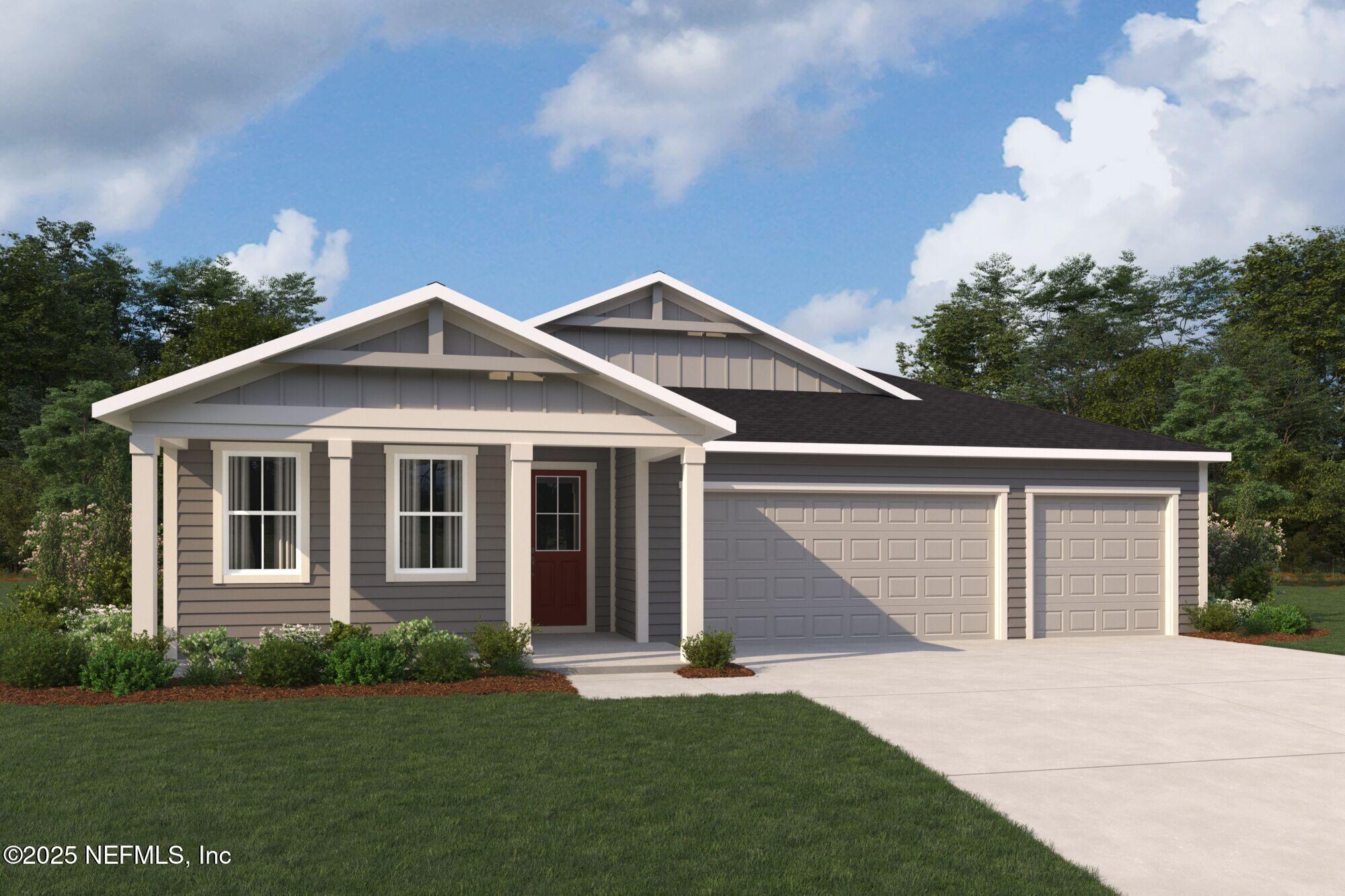 108 Orangedale Circle St. Johns, FL 32259 - Photo 1 of 48 a front view of a house with a garden and yard