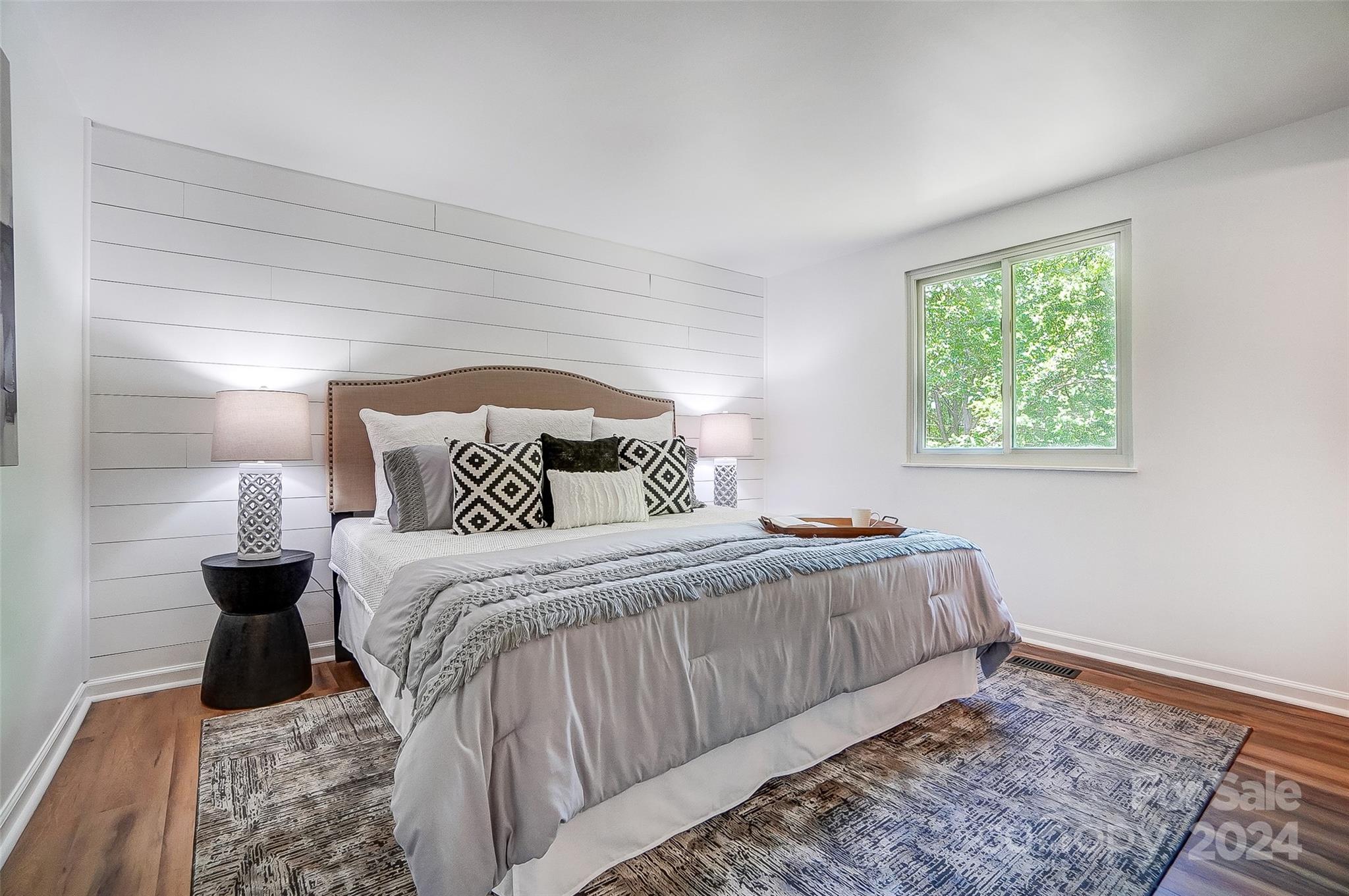 2236 Rice Planters Road Charlotte, NC 28273 - Photo 17 of 43 a bedroom with bed and a night stand