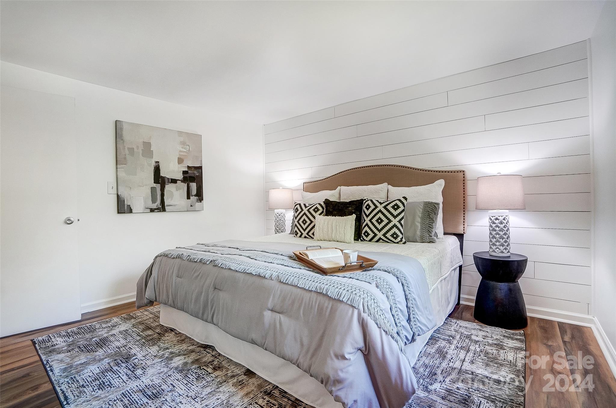 2236 Rice Planters Road Charlotte, NC 28273 - Photo 18 of 43 a bedroom with a bed and a couch